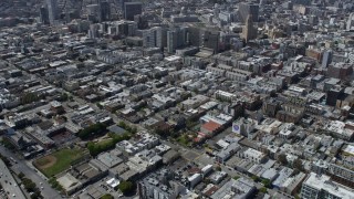 AX0175_0157 - 6K aerial stock footage of an urban neighborhood in South of Market, San Francisco, California