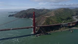 6K aerial stock footage of circling one of the towers on the Golden Gate Bridge, San Francisco, California Aerial Stock Footage | AX0175_0170