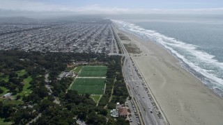 6K aerial stock footage of flying over Golden Gate Park and beach toward Outer Sunset, San Francisco, California Aerial Stock Footage | AX0175_0182