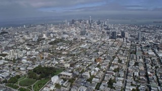 6K aerial stock footage of passing Alamo Square Park on the way to downtown, San Francisco, California Aerial Stock Footage | AX0175_0198