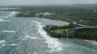 4.8K aerial stock footage of a Beachfront community along blue water, Dorado, Puerto Rico Aerial Stock Footage | AX101_213