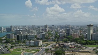 4.8K aerial stock footage of an Apartment and office buildings near the water, San Juan, Puerto Rico Aerial Stock Footage | AX102_001