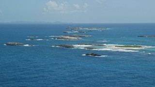 4.8K aerial stock footage of Tiny islands in tropical blue waters, Puerto Rico Aerial Stock Footage | AX102_085