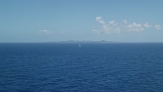 4.8K aerial stock footage Sapphire ocean waters and a distant island, Culebra, Puerto Rico  Aerial Stock Footage | AX102_095