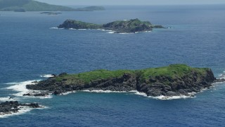 4.8K aerial stock footage of a Cluster of islands in sapphire blue waters, Culebra, Puerto Rico Aerial Stock Footage | AX102_102E