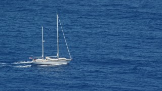 4.8K aerial stock footage sail boat in sapphire blue waters, Culebra, Puerto Rico Aerial Stock Footage | AX102_105E