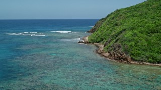 4.8K aerial stock footage of Sapphire blue waters along a rugged coastline, Culebra, Puerto Rico  Aerial Stock Footage | AX102_114