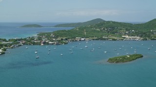 4.8K aerial stock footage of Sail boats in sapphire blue water near a coastal town, Culebra, Puerto Rico  Aerial Stock Footage | AX102_142