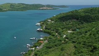 4.8K aerial stock footage of Lush vegetation along the coast and sapphire waters, Culebra, Puerto Rico  Aerial Stock Footage | AX102_153