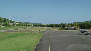 4.8K aerial stock footage of a Take off from Benjamín Rivera Noriega Airport over sapphire blue waters, Culebra  Aerial Stock Footage | AX102_166