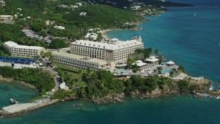 4.8K aerial stock footage of Marriott's Frenchman's Cove on sapphire blue waters,  St Thomas Aerial Stock Footage | AX102_231E