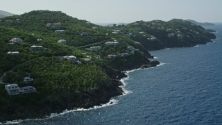 4.8K aerial stock footage of an Oceanfront hillside mansions, Northside, St Thomas  Aerial Stock Footage | AX102_267