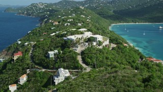 4.8K aerial stock footage of hillside oceanfront homes in sapphire blue Caribbean waters, Magens Bay, St Thomas Aerial Stock Footage | AX102_281E