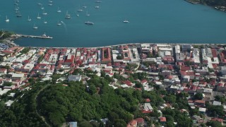 4.8K aerial stock footage of a Coastal town along sapphire blue Caribbean waters, Charlotte Amalie, St Thomas Aerial Stock Footage | AX102_303