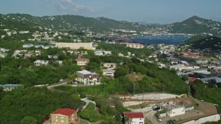 4.8K aerial stock footage Flying over homes in hills of coastal town, Charlotte Amalie, St Thomas Aerial Stock Footage | AX103_002