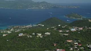 4.8K aerial stock footage Caribbean resorts along sapphire blue waters, East End, St Thomas Aerial Stock Footage | AX103_013