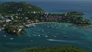 4.8K aerial stock footage of a resort overlooking the Caribbean blue harbor, Cruz Bay, St John Aerial Stock Footage | AX103_023E