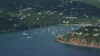 4.8K aerial stock footage of Hillside Caribbean mansions with harbor and ocean views, Cruz Bay, St John Aerial Stock Footage | AX103_062