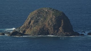 AX103_101E - 4.8K aerial stock footage of a tiny island in Caribbean blue waters, Culebra, Puerto Rico