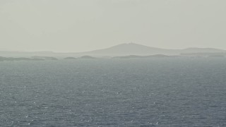 4.8K aerial stock footage of tiny Caribbean islands near an island coast, Puerto Rico Aerial Stock Footage | AX103_105E