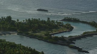 4.8K aerial stock footage tilt down on a small island's home in Caribbean waters, Puerto Rico Aerial Stock Footage | AX103_113E