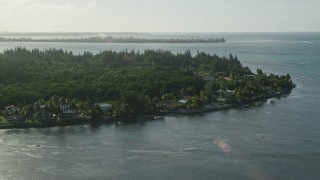 4.8K aerial stock footage of island homes with views of Caribbean blue waters, Puerto Rico Aerial Stock Footage | AX103_126E