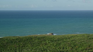 AX103_138 - 4.8K aerial stock footage of Turquoise blue waters, Loiza, Atlantic Ocean