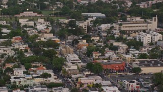 4.8K aerial stock footage of Beachfront hotels and ocean waters, San Juan, Puerto Rico, sunset Aerial Stock Footage | AX104_068