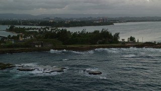 4.8K aerial stock footage of Isla de Cabras, San Juan twilight Aerial Stock Footage | AX104_091E