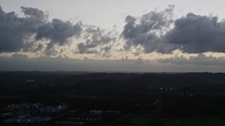 4.8K aerial stock footage of Clouds over a Caribbean town, Dorado, Puerto Rico, twilight Aerial Stock Footage | AX104_137