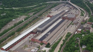 4.8K aerial stock footage flying over a factory, Turtle Creek, Pennsylvania Aerial Stock Footage | AX105_007