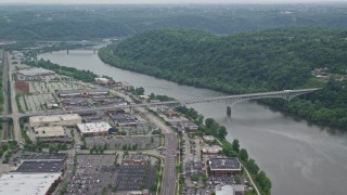 4.8K aerial stock footage of a shopping mall and Homestead Grays Bridge, Pittsburgh, Pennsylvania Aerial Stock Footage | AX105_073E