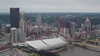 AX105_203E - 4.8K aerial stock footage of skyscrapers and convention center, Downtown Pittsburgh, Pennsylvania