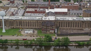 4.8K aerial stock footage of an old building, zoom to wider view of Western State Penitentiary, Pittsburgh, Pennsylvania Aerial Stock Footage | AX105_219E