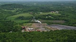 AX106_032 - 4.8K aerial stock footage of a recycling center in Zelienople, Pennsylvania