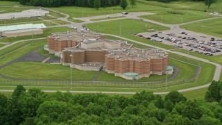 AX106_081E - 4.8K aerial stock footage orbiting Ohio State Penitentiary, Youngstown, Ohio