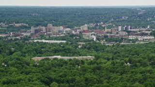 AX106_093 - 4.8K aerial stock footage of high rises, Downtown Youngstown, Ohio