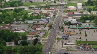 4.8K aerial stock footage of a city street, shops and strip mall in Youngstown, Ohio Aerial Stock Footage | AX106_101E