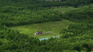 4.8K aerial stock footage of isolated home and pond in Newton Falls, Ohio Aerial Stock Footage | AX106_137