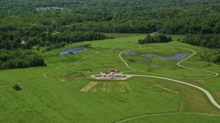 4.8K aerial stock footage of green lawns at Frohring Meadows Park, Chagrin Falls, Ohio Aerial Stock Footage | AX106_175