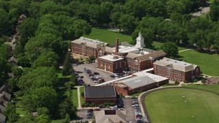 AX106_190 - 4.8K aerial stock footage orbiting an elementary school in Shaker Heights, Ohio