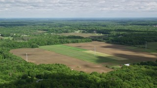 4.8K aerial stock footage of farms and trees, Ravenna, Ohio Aerial Stock Footage | AX107_086E