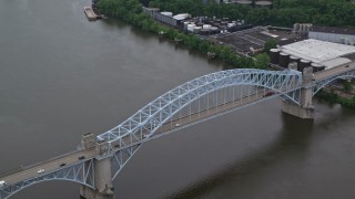 4.8K aerial stock footage of McKees Rocks Bridge spanning Ohio River, Pittsburgh Aerial Stock Footage | AX107_164E