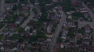 4K aerial stock footage of urban neighborhoods, Pittsburgh, Pennsylvania, twilight Aerial Stock Footage | AX108_044E