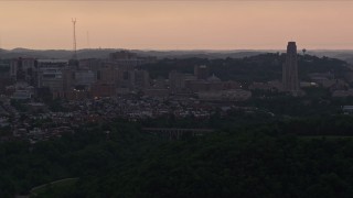 4K aerial stock footage of University of Pittsburgh campus, Pennsylvania, sunset Aerial Stock Footage | AX108_050E