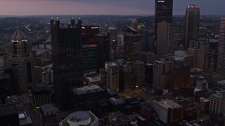 4K aerial stock footage of a view of the city's skyscrapers in Downtown Pittsburgh, twilight Aerial Stock Footage | AX108_066E