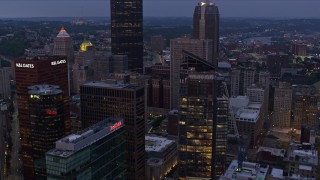 4K aerial stock footage flying over skyscrapers, Downtown Pittsburgh, Pennsylvania, twilight Aerial Stock Footage | AX108_100E