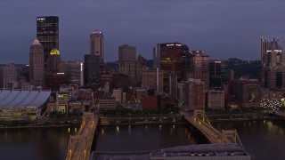 4K aerial stock footage a view of tall Downtown Pittsburgh skyscrapers, Pennsylvania, twilight Aerial Stock Footage | AX108_116E