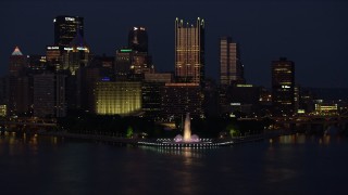 4K aerial stock footage of Downtown Pittsburgh skyscrapers and Point State Park; night Aerial Stock Footage | AX108_164E