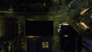 4K aerial stock footage of a bird's eye of Forbes Avenue and buildings Downtown Pittsburgh, Pennsylvania, night Aerial Stock Footage | AX108_180E